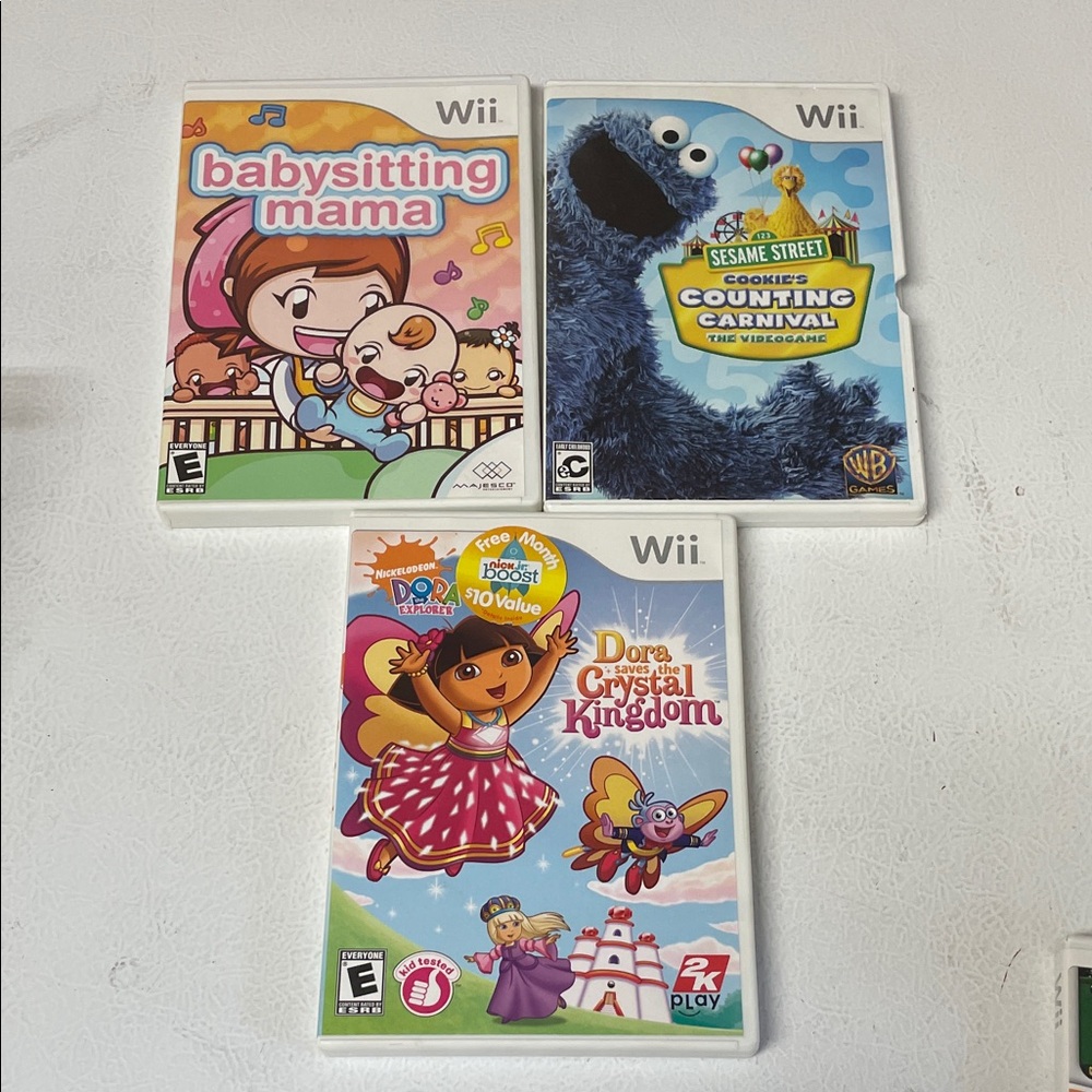 Wii Kids Game Bundle - Babysitting Mama, Sesame Street, Dora UNTESTED